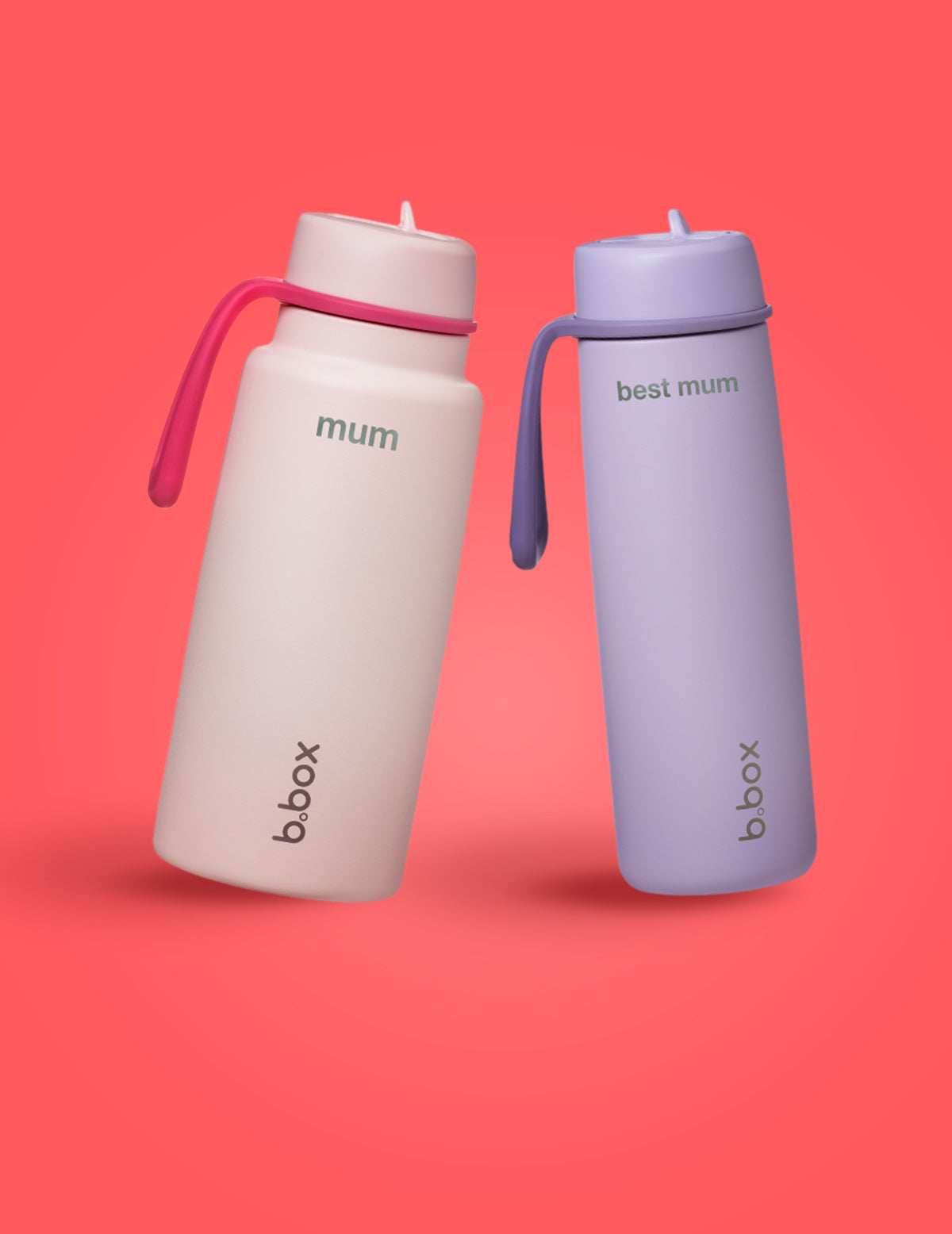Two water bottles, one pink and one purple, with 'b.box' branding on a red background.