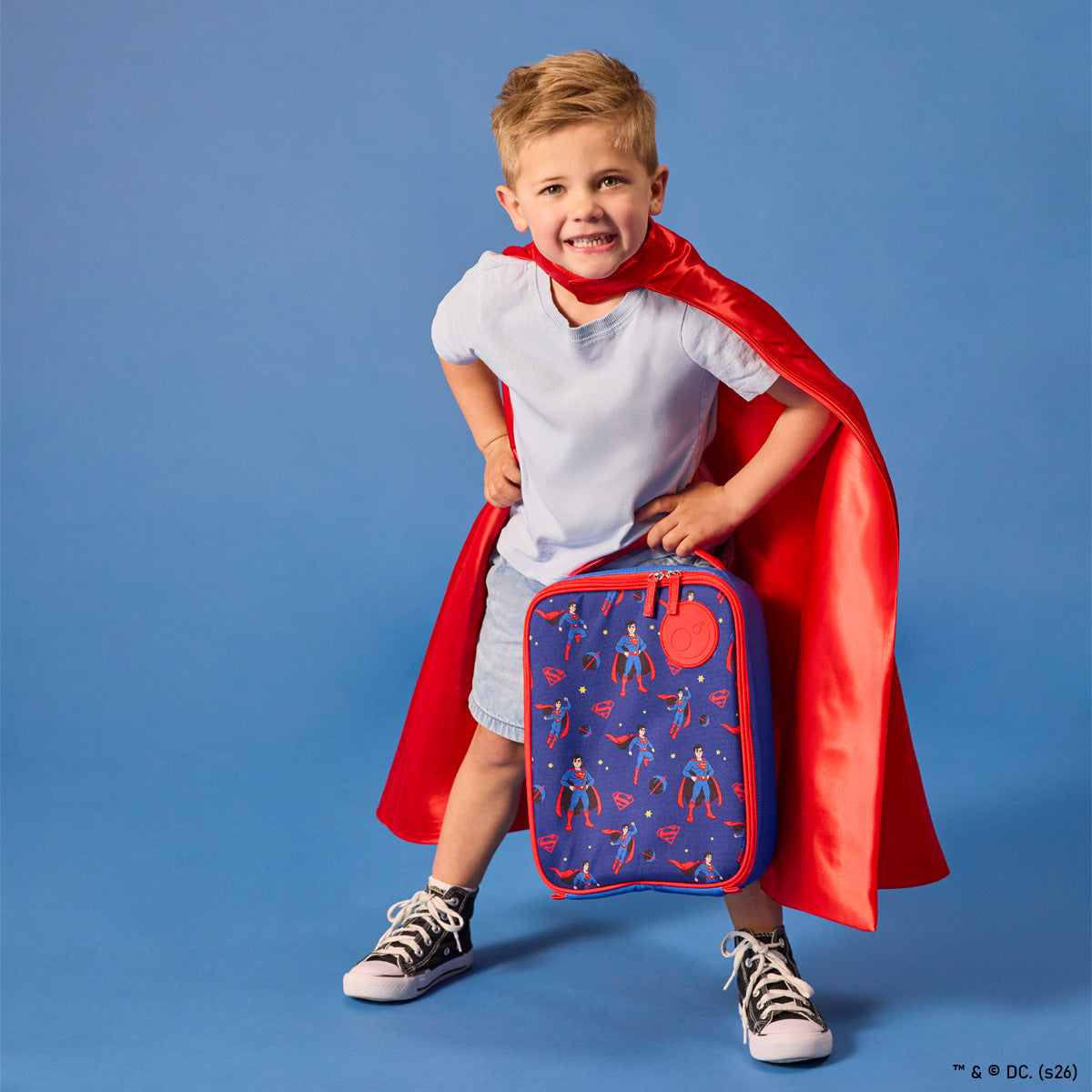 Superman-themed lunch bag with red accents on a white background
