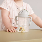 child with b.box for kids: winnie the pooh sippy cup